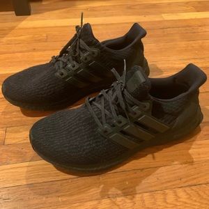 Black adidas ultra boosts DNA